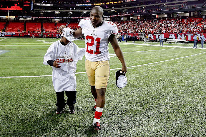 Gore Sr. and Gore Jr. in 2013 after the 49ers won the NFC championship game.